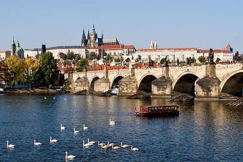 Enjoy the Prague landmarks from the unusual angle from a boat