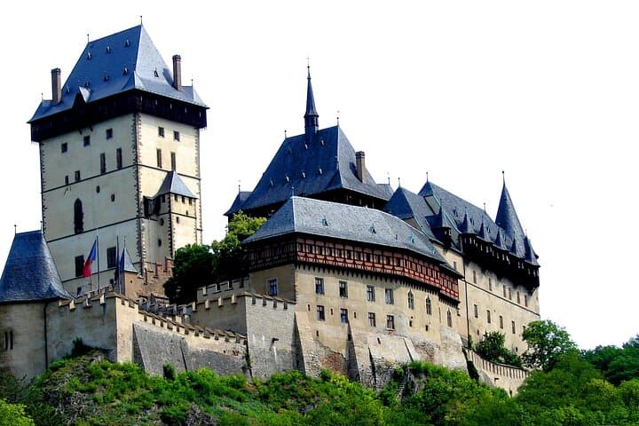 Karlstejn Castle in Vintage Convertible Car
