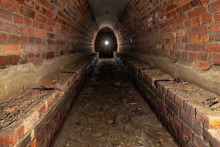 This WWII Nazi-built shelter withstood only its own AA shrapnel. Bomb hits were fatal, prompting its abandonment after the first air raids.