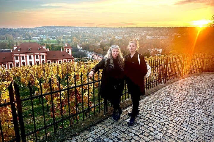 An unforgettable vineyard sunset above Troja Château and the Prague skyline.