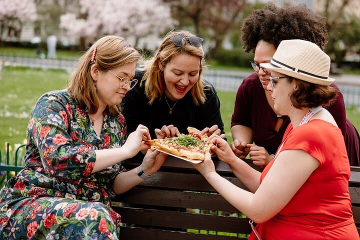 Guests savoring traditional Czech snacks during their Easter markets tour