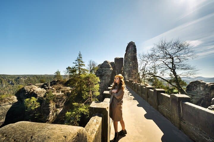 Take in breathtaking views from the iconic Bastei Bridge.