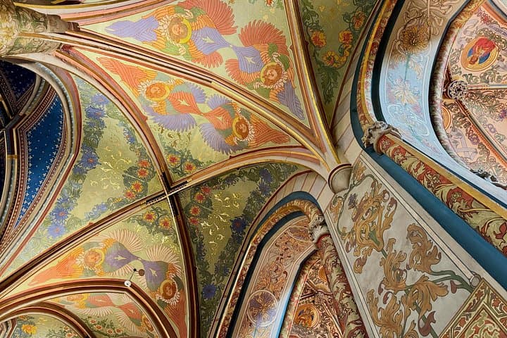 The majestic neo-Gothic Basilica of St. Peter and St. Paul, including entry to its extraordinary Art Nouveau interior, adorned with Alfons Mucha–inspired frescoes