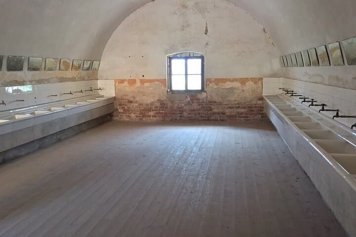 One of the many stark rooms that witnessed unspeakable history.