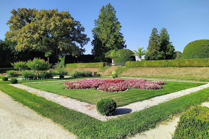 Explore the grandeur and history of Lednice Castle, surrounded by beautiful gardens.