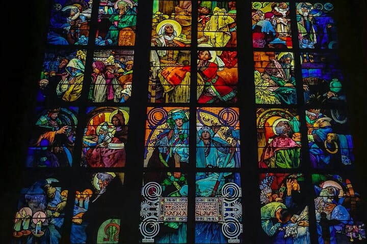 Marvel at the beautiful stained glass windows inside the St. Vitus cathedral