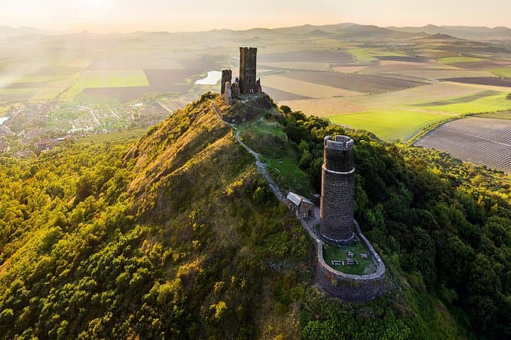 The aerial castle ruin at golden hour.