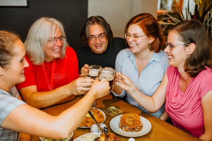 Toast with Czech beer and enjoy a sit-down stop with the group.